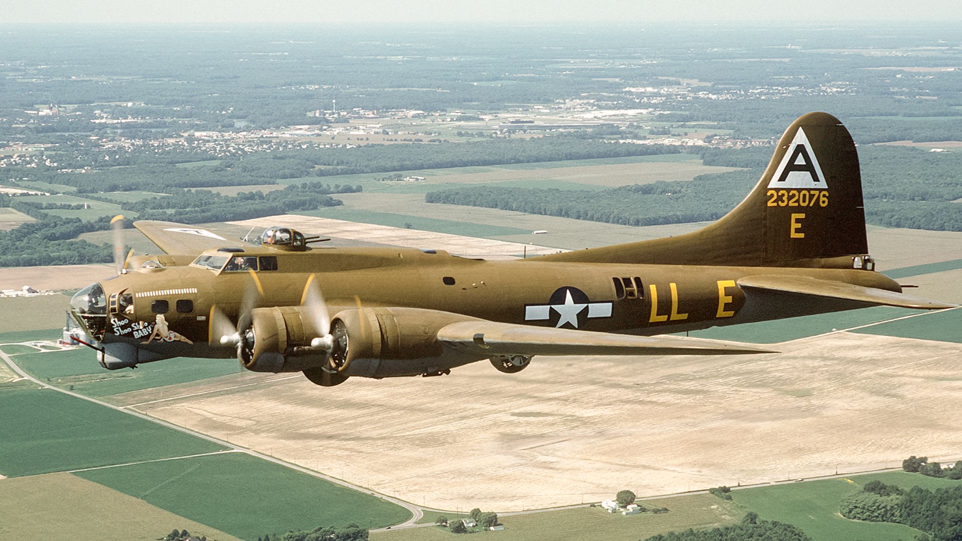 A left side view of the restored B-17G Flying Fortress aircraft