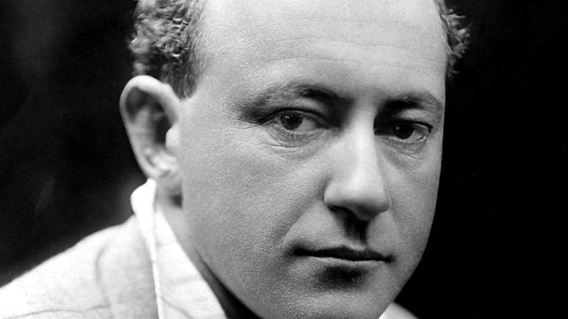 Publicity portrait of Cecil B. DeMille. On the back has been written: