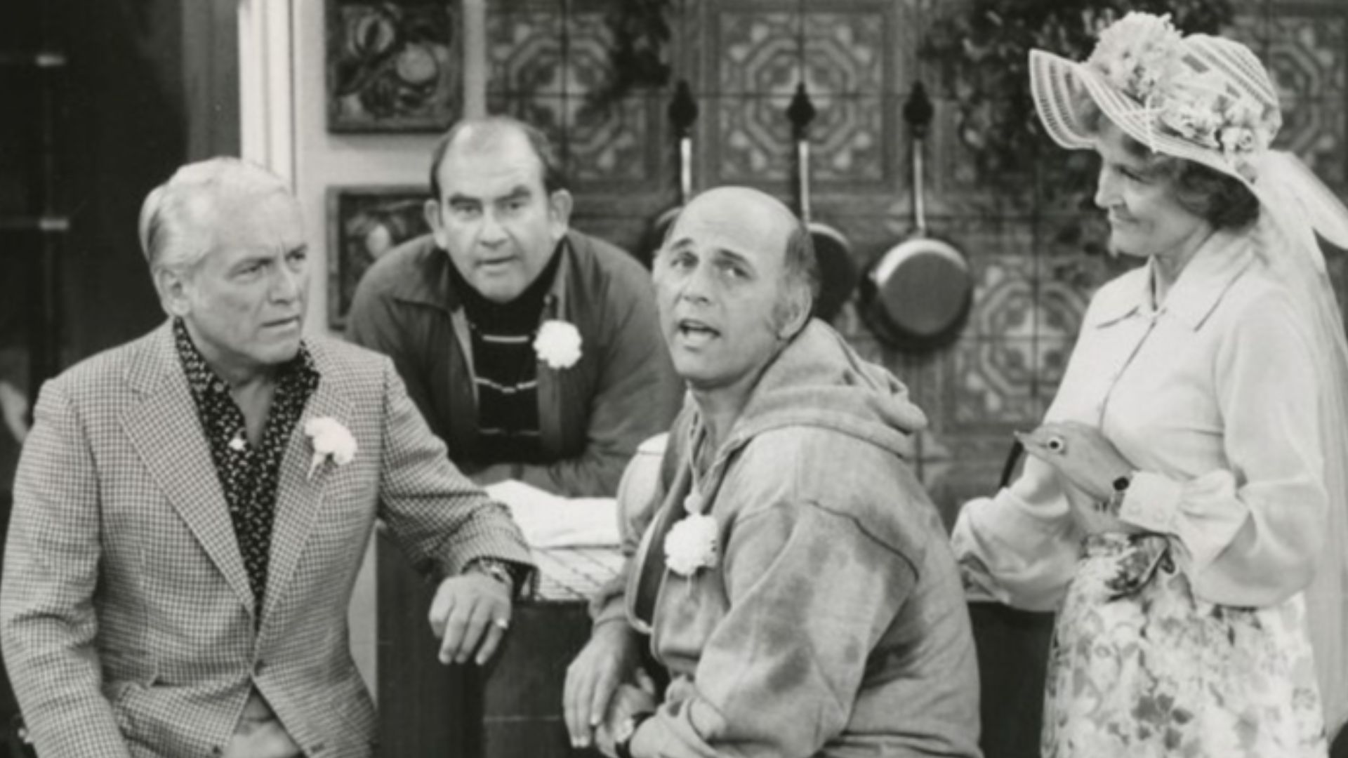 Publicity photo of Ted Knight, Ed Asner, Gavin MacLeod and Betty White from The Mary Tyler Moore Show. In this episode, Ted and Georgette decide to be married while at Mary's dinner party, and the wedding is arranged immediately.  Ted and friends wait in 