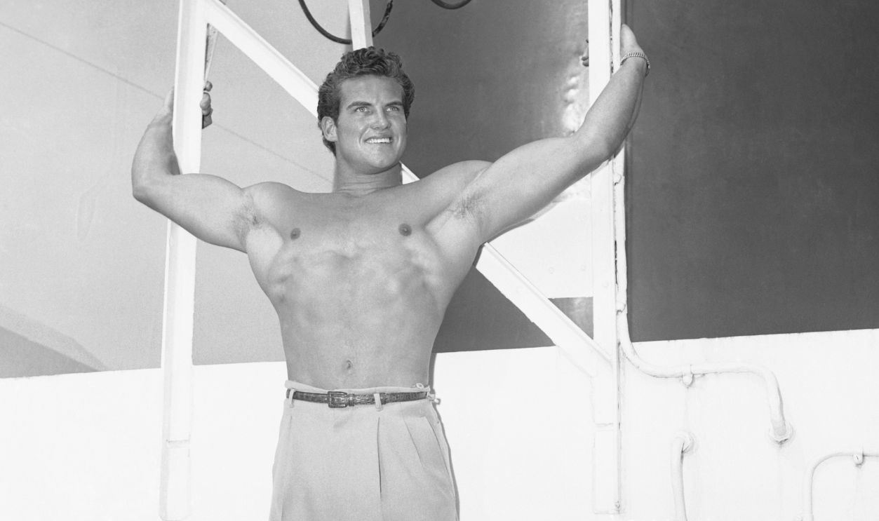 Steve Reeves as Mr. America in Ship's Makeshift Gym