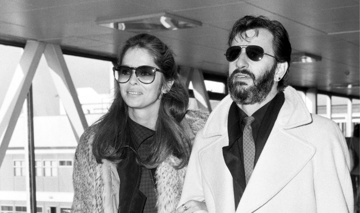 Former Beatles drummer Ringo Starr with his girlfriend Barbara Bach leaving Heathrow Airport in London to return to New York. They had been on a two-week visit to England to celebrate Ringo's daughter Lee's 10th birthday.