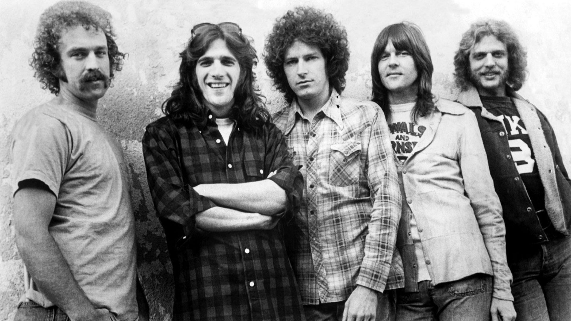 Press photo of the band Eagles by Asylum. Although no date is given, it dates from 1974 to 1975, as those were the only two years the lineup depicted was active. No copyright markings on the photo.