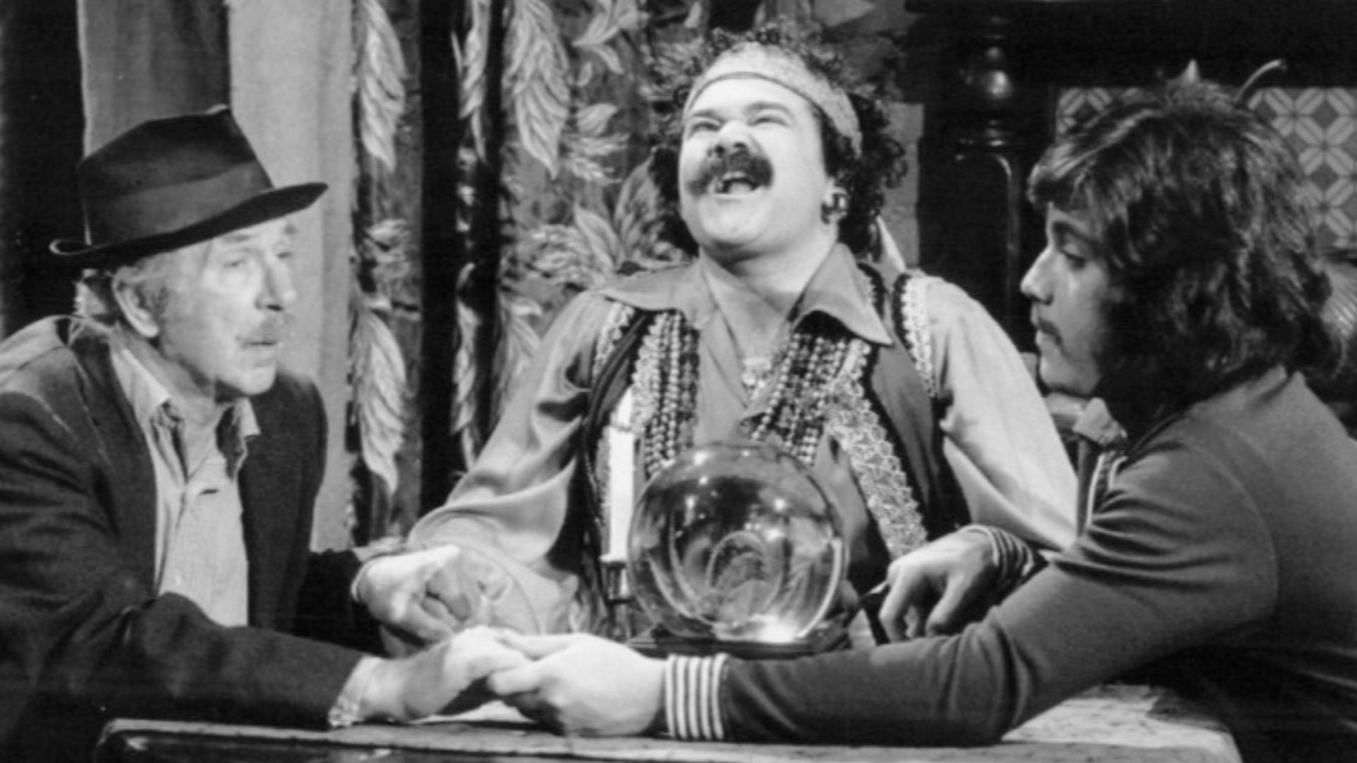 Photo of Jack Albertson, Avery Schreiber and Freddie Prinze from the television program Chico and the Man.  Schreiber plays a very unsuccessful fortune teller Ed and Chico are trying to help out.