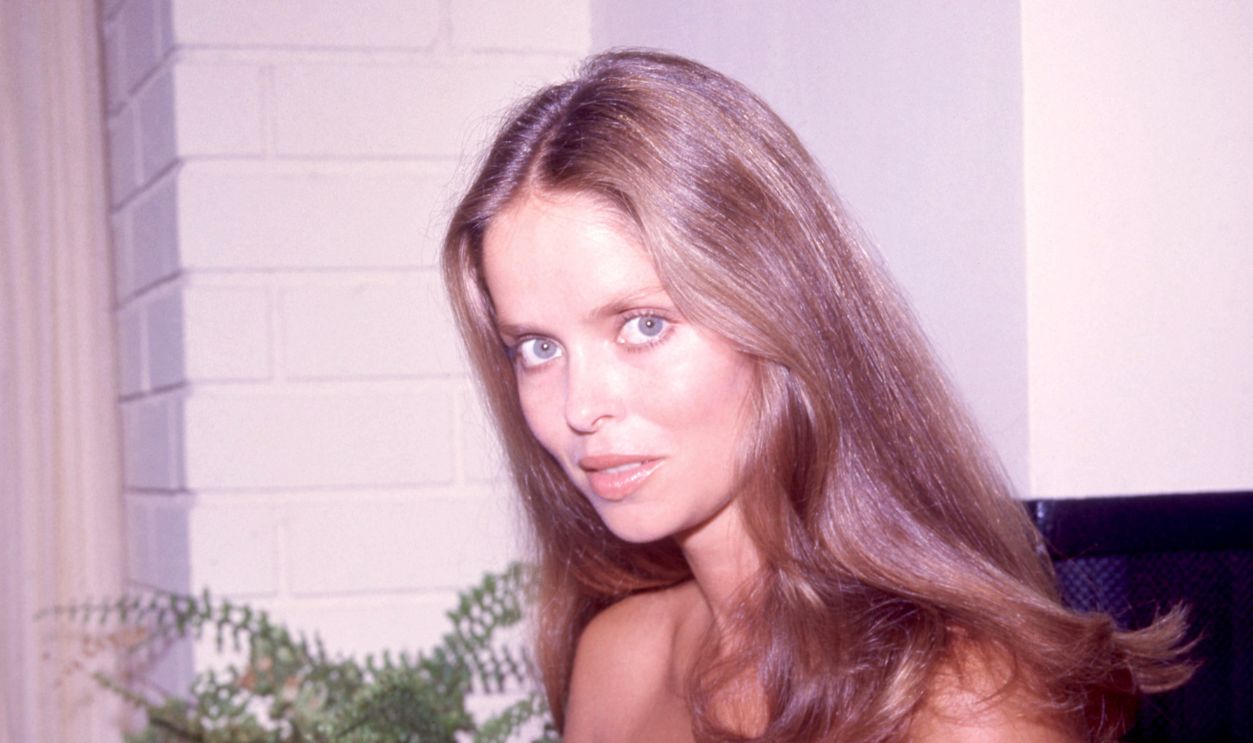 Portrait of American actor & model Barbara Bach, wearing a strapless romper, Los Angeles, California, January 1979