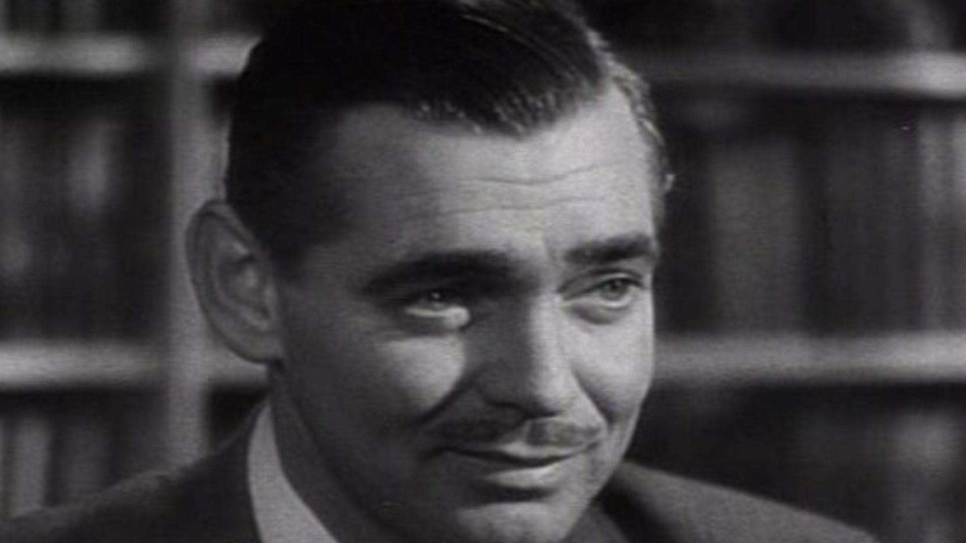 Frame from the trailer for MGM's 1947 film The Hucksters showing Clark Gable's face and his name superimposed in type