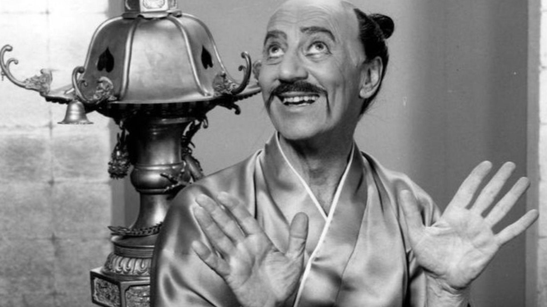 Photo of Groucho Marx as Koko the Lord High Executioner in a performance of The Mikado from the television program The Bell Telephone Hour.