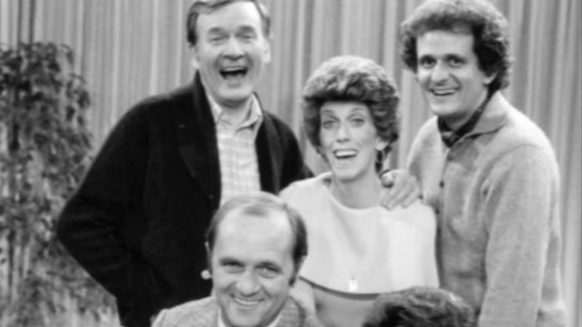 Publicity photo of the cast of The Bob Newhart Show.  Standing from left: Bill Daily (Howard Borden), Marcia Wallace (Carol Kester), Peter Bonerz (Jerry Robinson).  Seated: from left: Bob Newhart (Bob Hartley), Suzanne Pleshette (Emily Hartley).