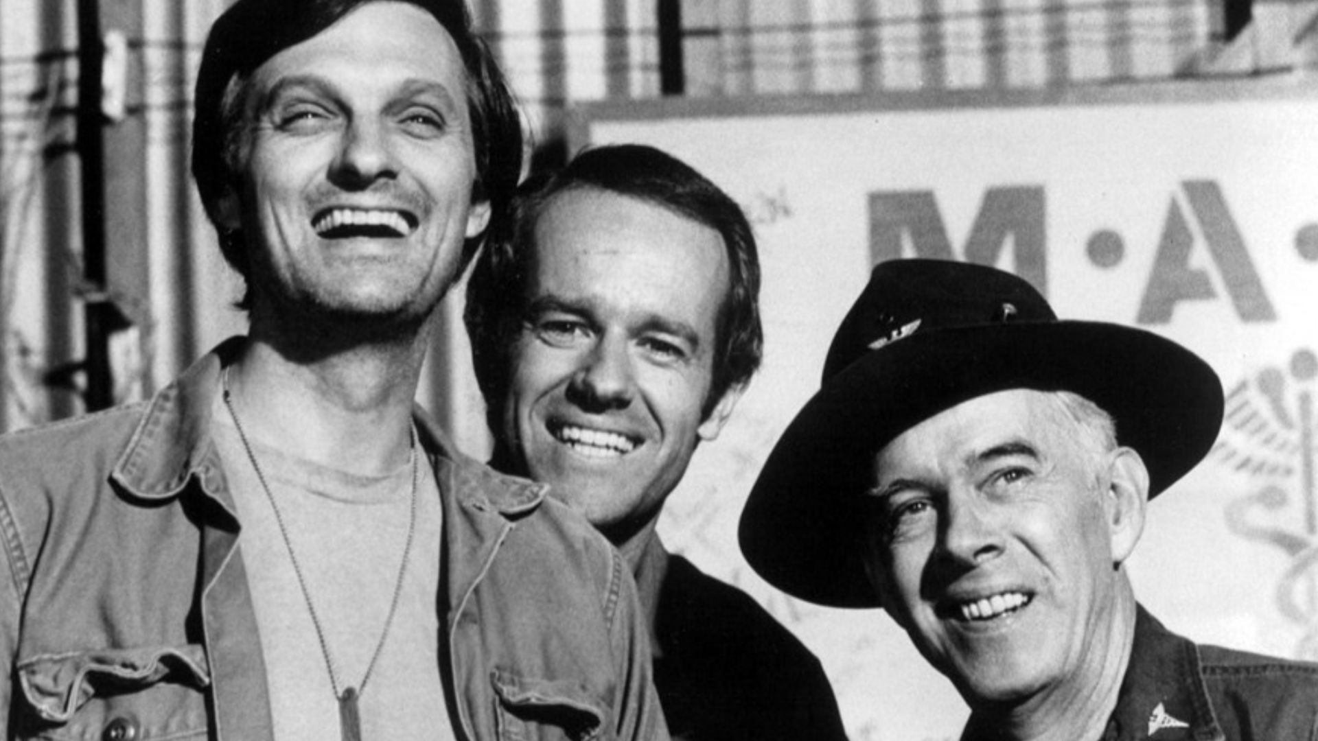 Publicity photo of some M*A*S*H cast members for 1975-Alan Alda, Mike Farrell and Harry Morgan. This season Morgan joined the show as Colonel Potter.