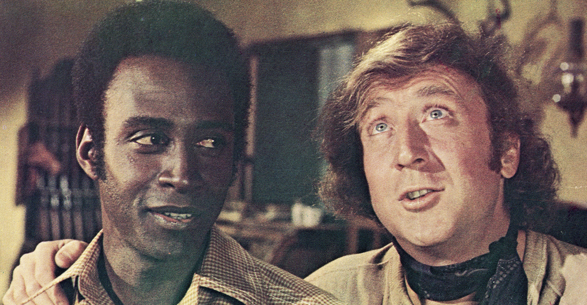 Actor Gene Wilder (right) puts his arm around the shoulder of Cleavon Little in a still from the film, 'Blazing Saddles,' directed by Mel Brooks, 1974. 