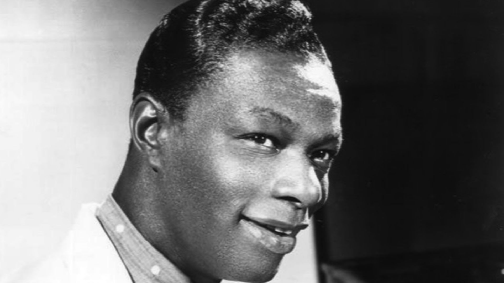 Publicity photo from the premiere of The Nat King Cole Show.  Cole was the first African-American to host a program of this type.