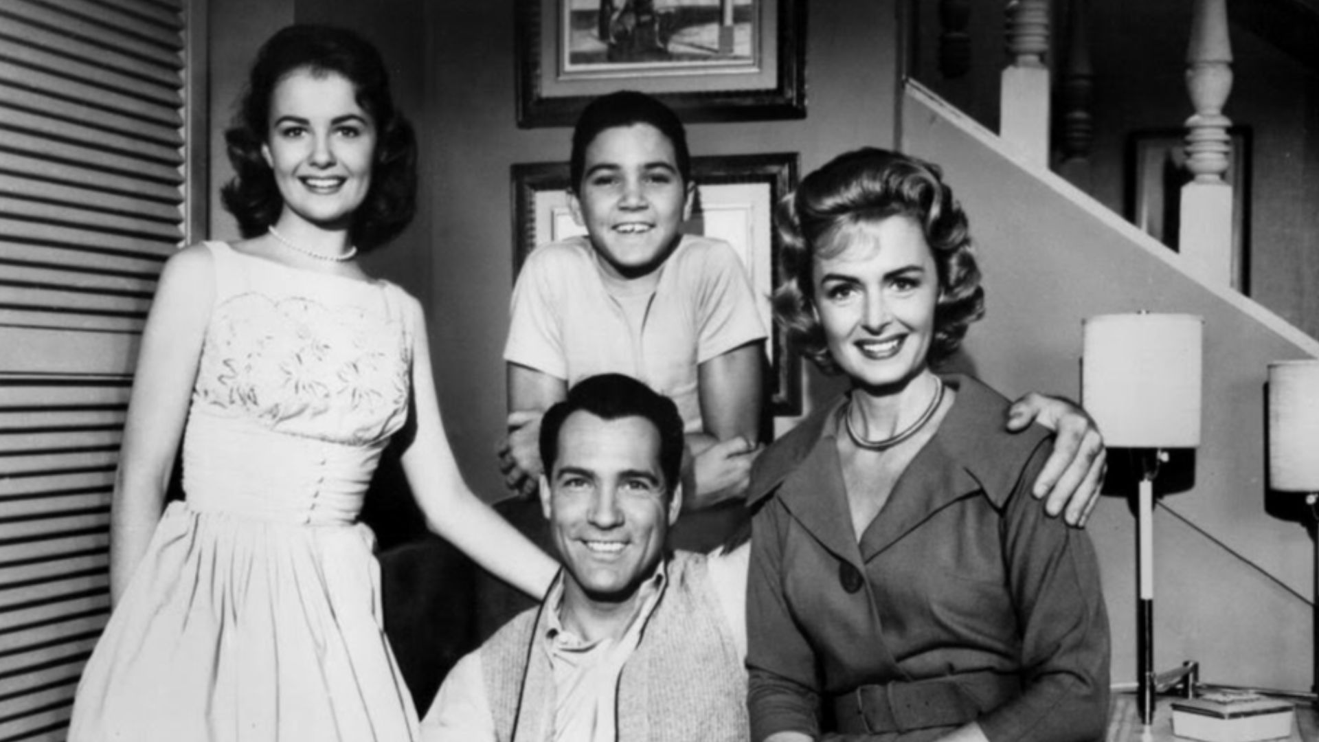 Cast photo from the television program The Donna Reed Show. Standing-Shelley Fabares and Paul Petersen. Seated-Carl Betz and Donna Reed.