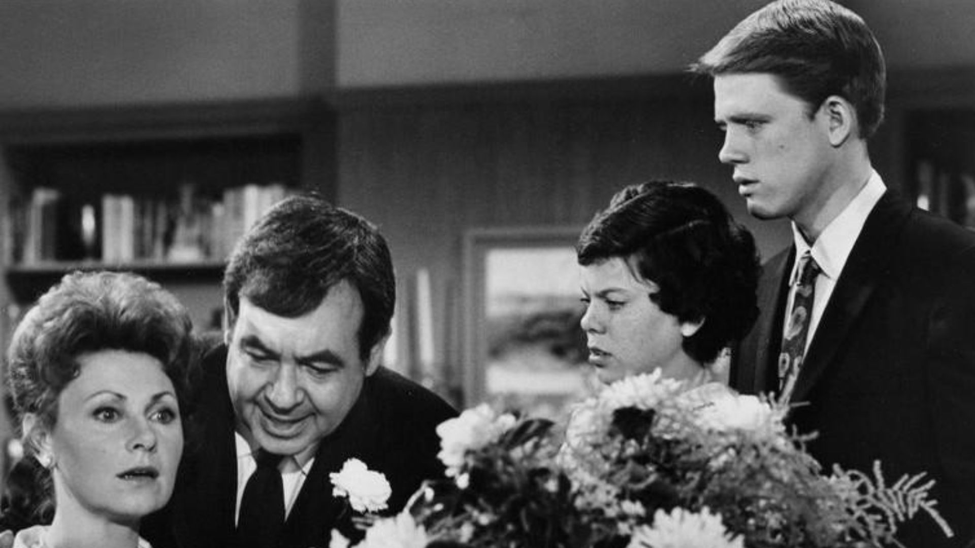 Photo of the Cunningham family from the television program Happy Days.  Pictured are Marion Ross (Mrs. Cunningham), Tom Bosley (Mr. Cunningham), Erin Moran (Joanie Cunningham) and Ron Howard (Richie Cunningham).