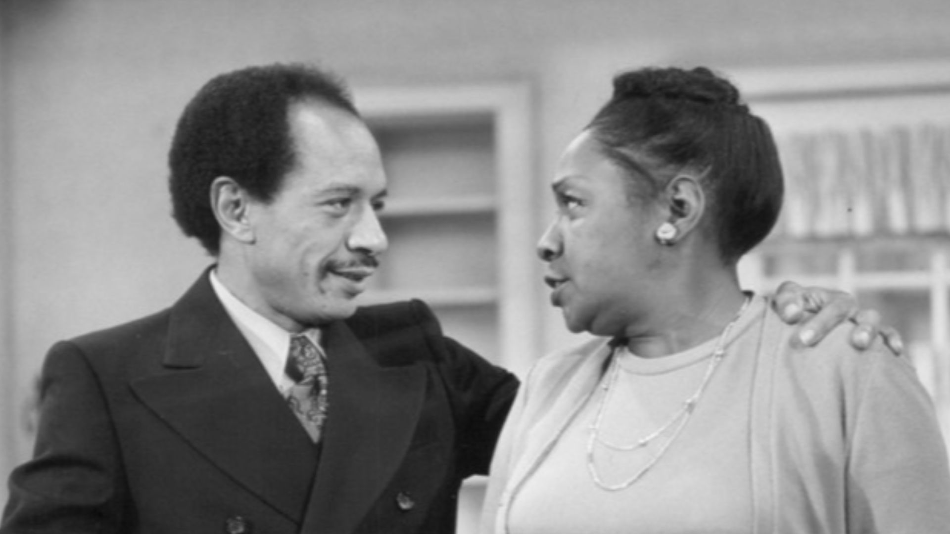 Publicity photo from  All in the Family. Pictured are Sherman Helmsley (George Jefferson) and Isabel Sanford (Louise Jefferson) as they pack to move from Queens to Manhattan. This began the television series The Jeffersons.