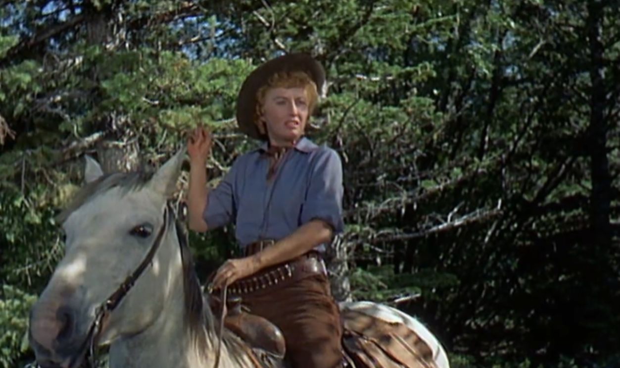 Screenshot from Cattle Queen of Montana (1954)