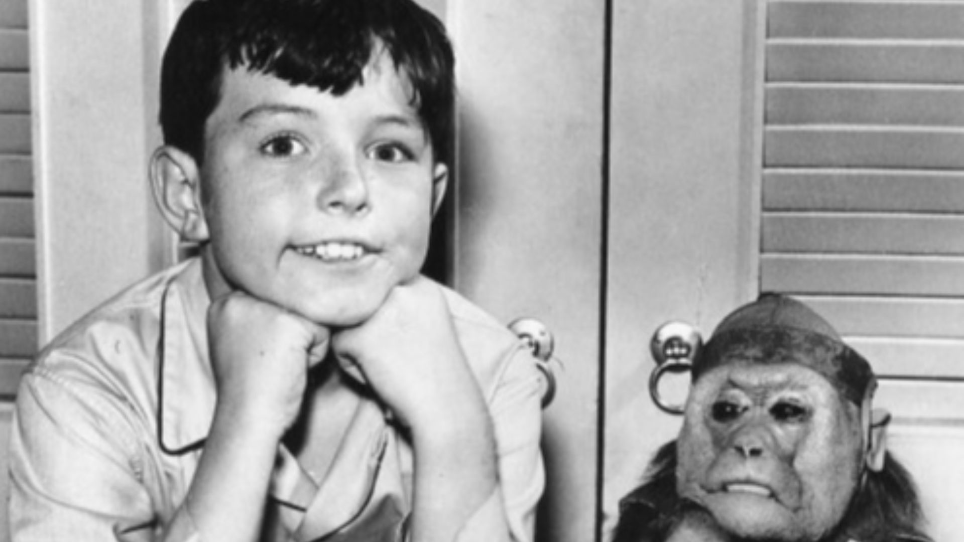 Photo of Jerry Mathers as Beaver Cleaver and his monkey, Stanley, from the television program Leave It to Beaver.