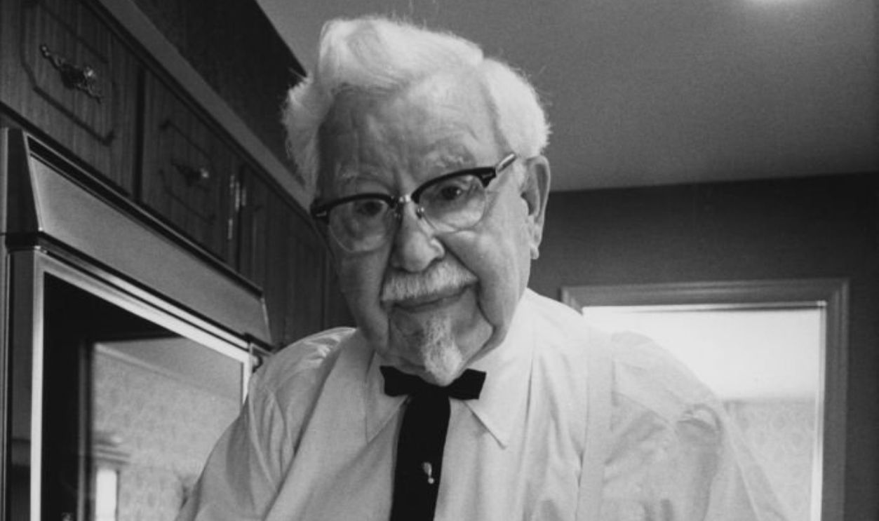 Founder of restaurant chain Kentucky Fried Chicken, Colonel Harland David Sanders (September 9, 1890 – December 16, 1980) holding a bowl with his fried chicken batter. Kentucky September 1974