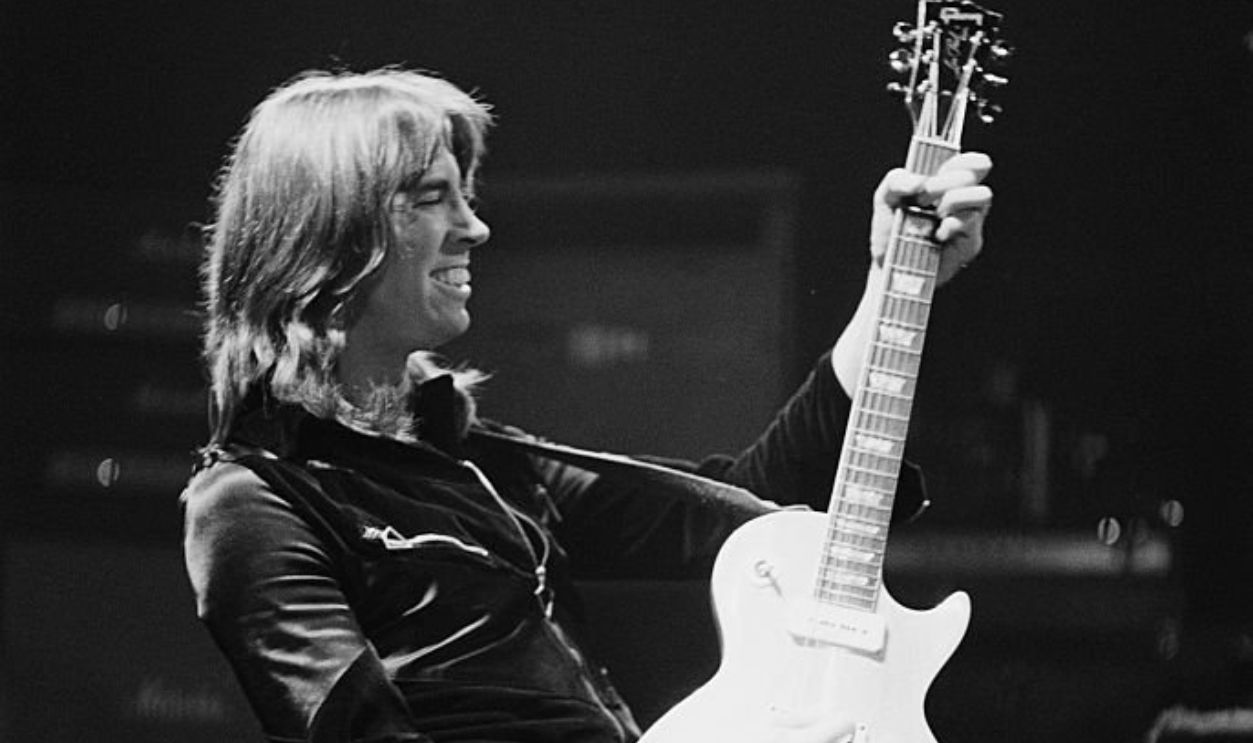 American musician Tom Scholz performing with American rock group, Boston, 19th April 1977.
