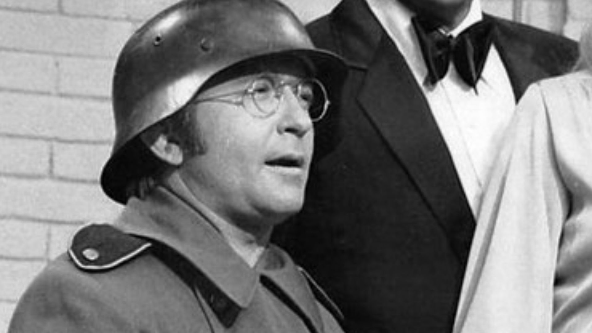 Photo of Arte Johnson, Dean Martin and Diana Shatz from the television program The Dean Martin Show. Johnson is dressed as his Laugh-In German soldier character.