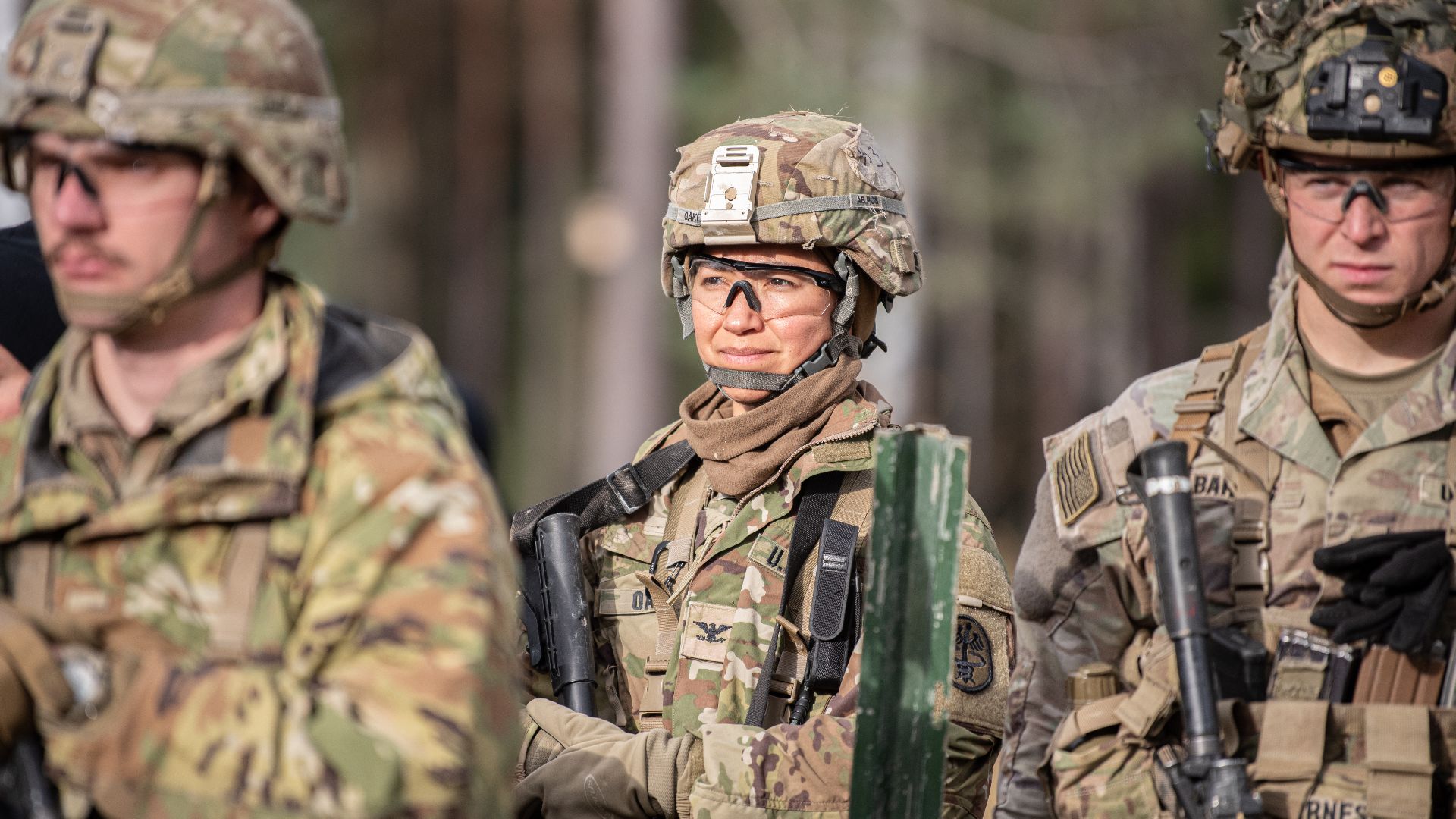 U.S. Army Col. Leslie Oakes, assigned to the 30th Medical Brigade, 21st Theater Sustainment Command, prepares to conduct day-time land navigation in order to earn the Expert Field Medical Badge (EFMB) on November 6, 2023, at Grafenwohr South Land Navigati
