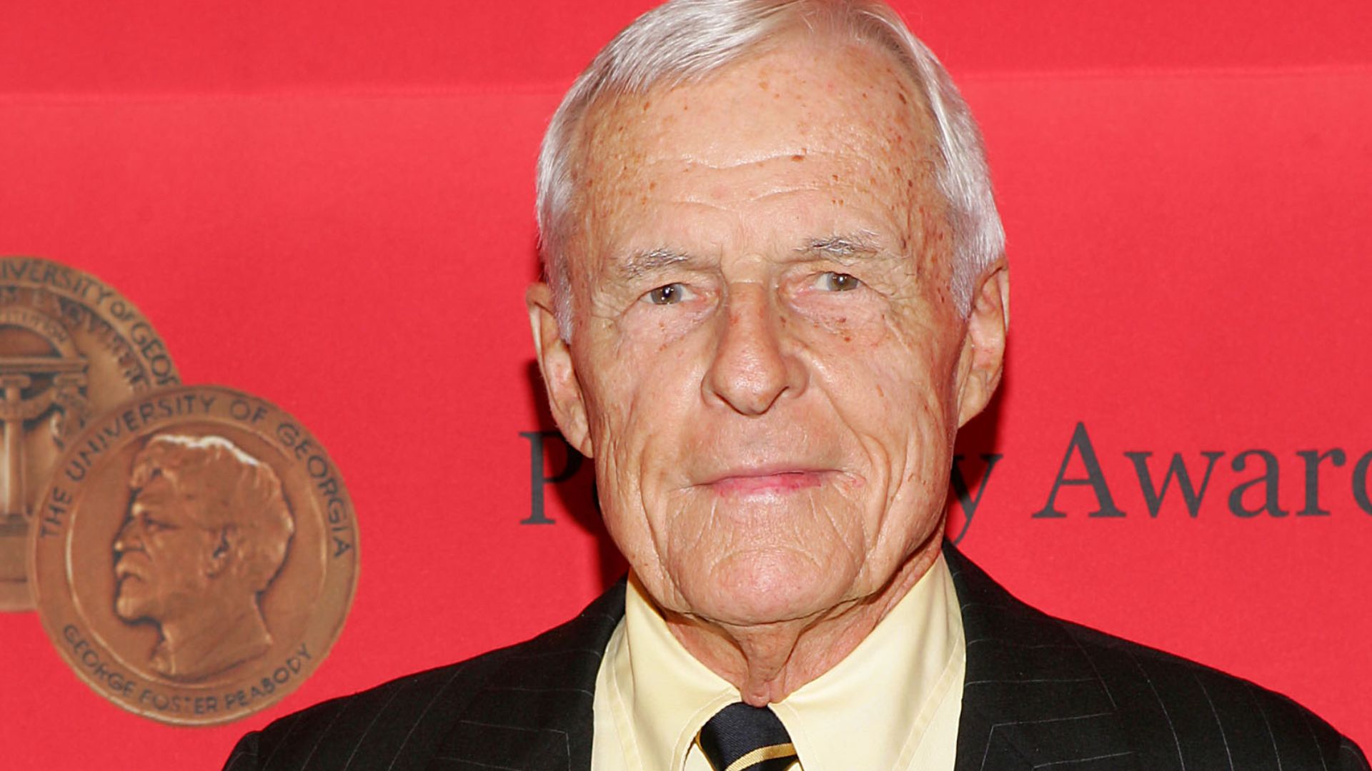 Grant Tinker shows his award trophy at the 64th Annual George Foster Peabody Awards presented by the University of Georgia honors excellence in electronic media. The ceremony was held at the Waldorf Astoria Hotel in New York City.AF32710