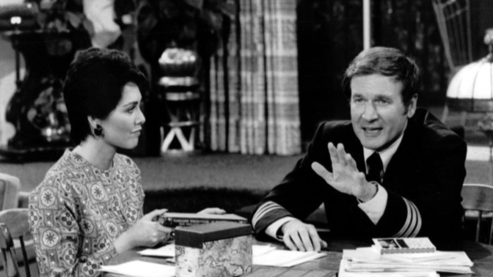 Photo from the television program The Bob Newhart Show.  Emily (Suzanne Pleshette) listens to Howard (Bill Daily).