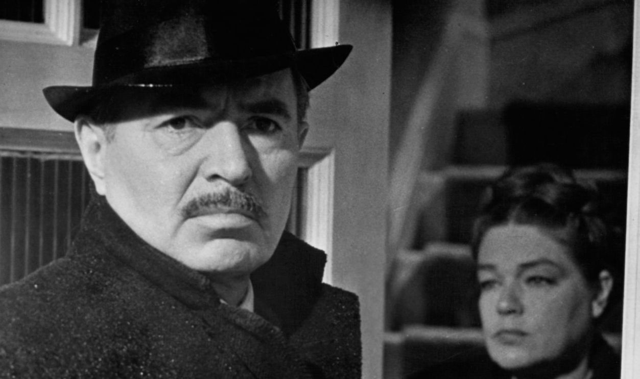 James Mason is greeted by Simone Signoret in a scene from the film 'The Deadly Affair', 1966.