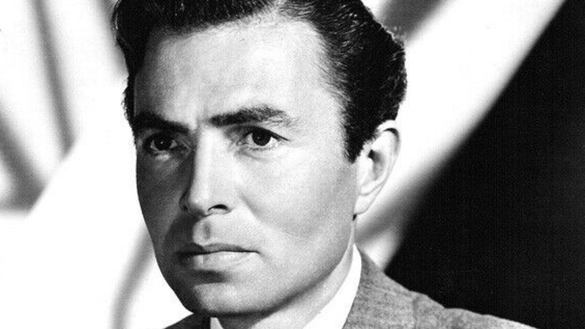 Studio publicity photo of British actor James Mason