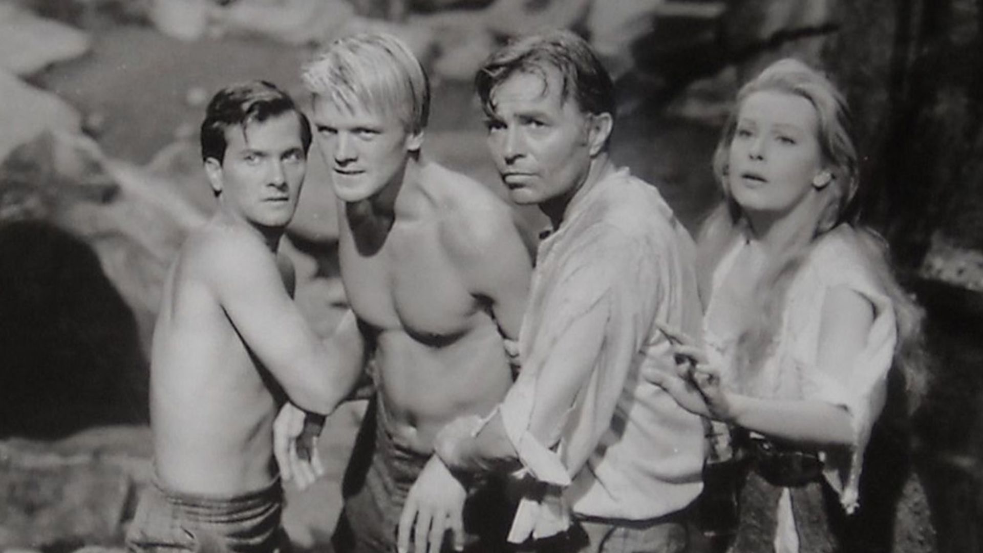 Pat Boone, Peter Ronson, James Mason, and Arlene Dahl in the American science fiction adventure film Journey to the Center of the Earth (1959).