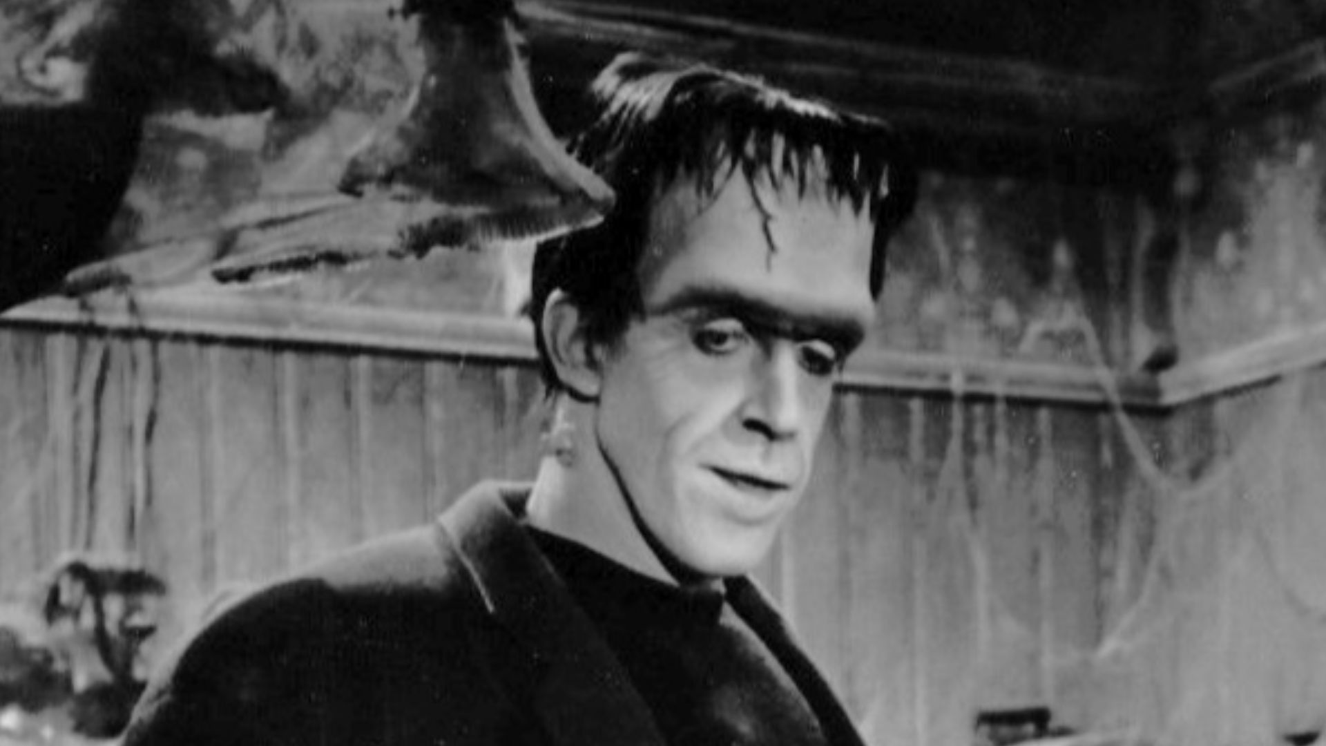 Photo of Fred Gwynne (Herman Munster) and Yvonne DeCarlo as his wife, Lily, from the television program The Munsters.