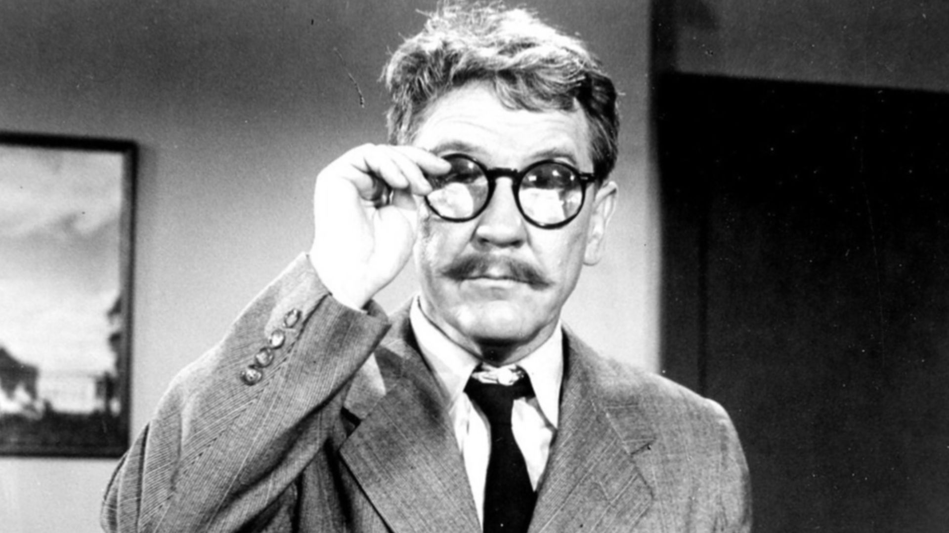 Publicity photo of Burgess Meredith as Henry Bemis in The Twilight Zone episode,