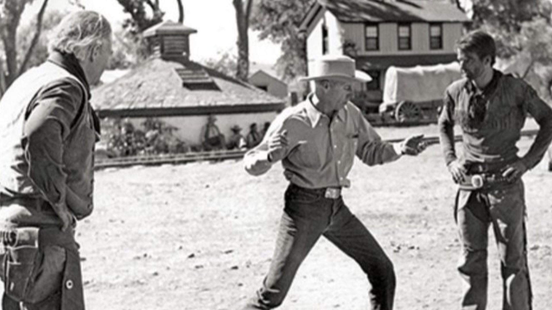 Director Howard Hawks instructing John Wayne and Montgomery Clift on the set of Red River (released 1948)