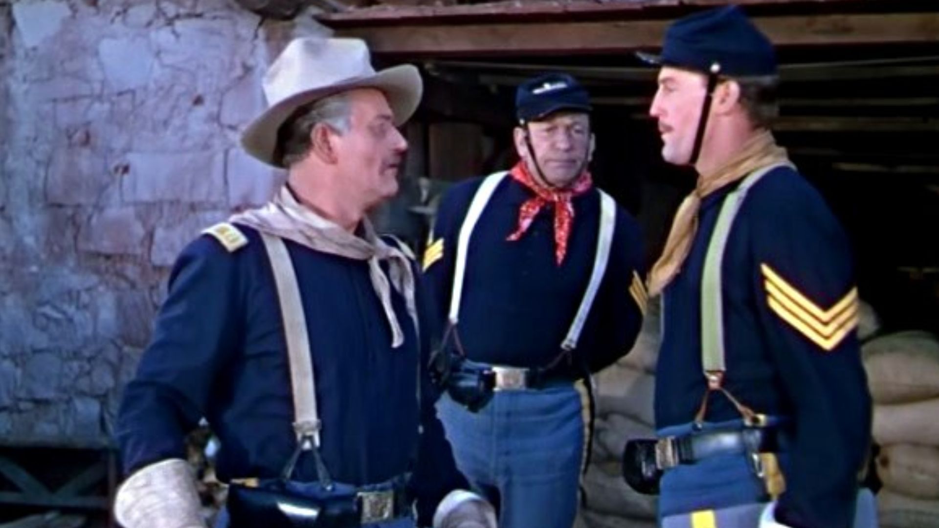 This image is a screenshot from a public domain trailer for the 1949 film, en:She Wore A Yellow Ribbon. 
Trailers for movies released before 1964 are in the Public Domain because they were never separately copyrighted.