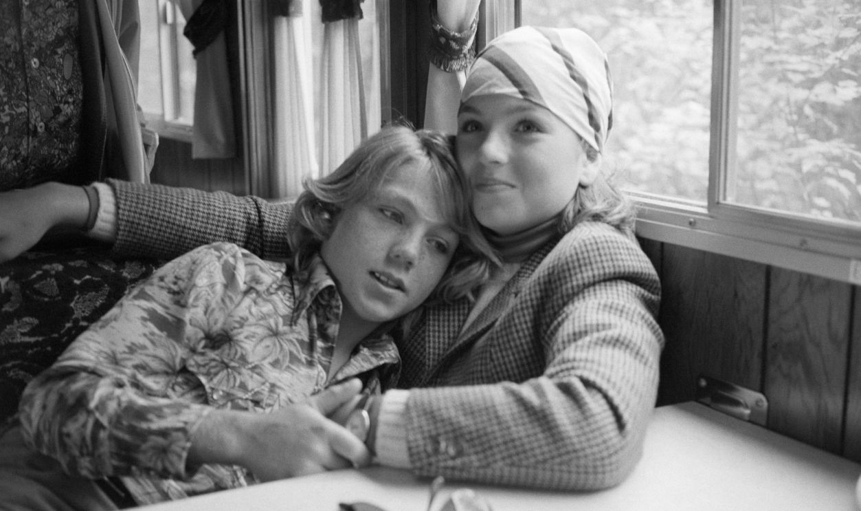 Griffin O'Neal, 12, leans on shoulder of sister Tatum O'Neal during visit to her mobile dressing room. Tatum was in Hamilton for annual LedyardFarm Horse trials which will be used in her movie