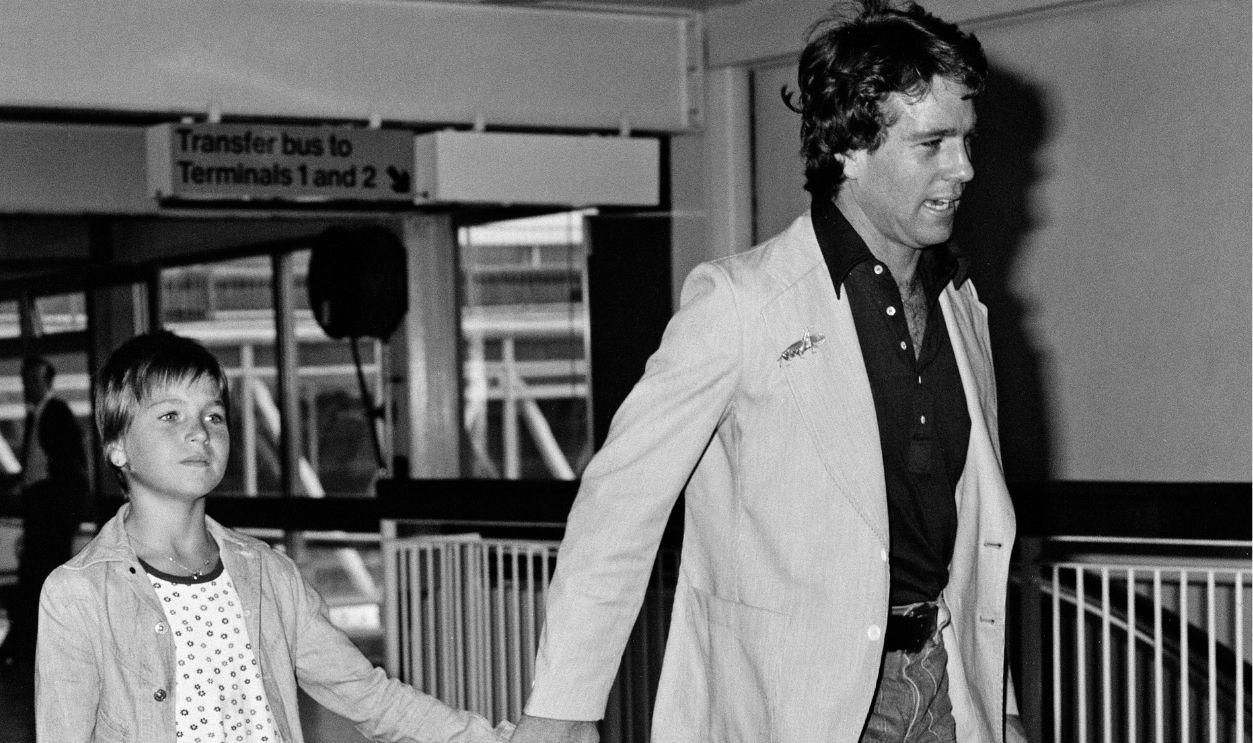 Sabrina Guinness and actress Tatum O'Neal leave Heathrow Airport for a holiday alongside Tatum's dad Ryan O'Neal, 27th July 1974.
