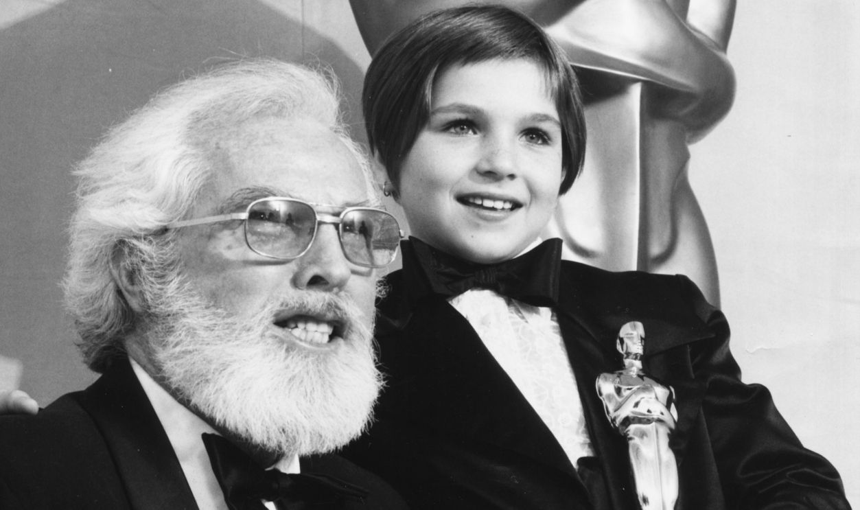 Child actress Tatum O'Neal holding her Best Supporting Actress Oscar, with her grandfather Charles O'Neal, at the 46th Academy Awards, Los Angeles, April 2nd 1974. 