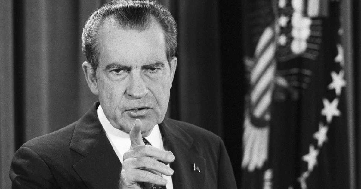 President Richard Nixon points to a reporter during his televised news conference in the East Room of the White House, March 06, 1974