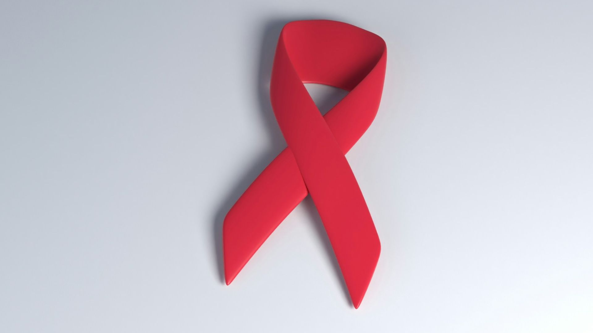 a red ribbon on a white background