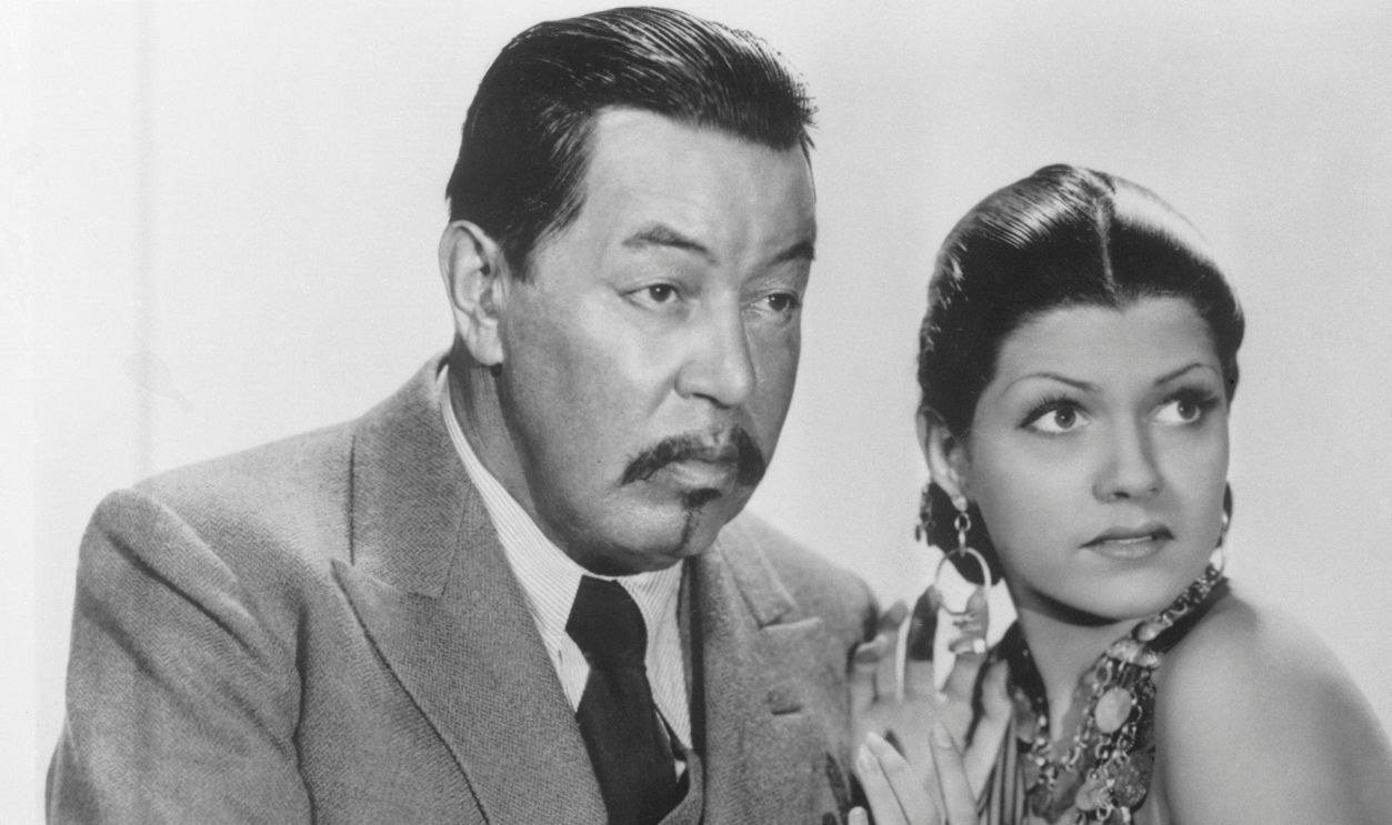 Warner Oland is with Rita Cansino, who later changed her name to Rita Hayworth, in Charlie Chan in Egypt, filmed in 1935 and now part of a wide-spread revival of the Chan movies