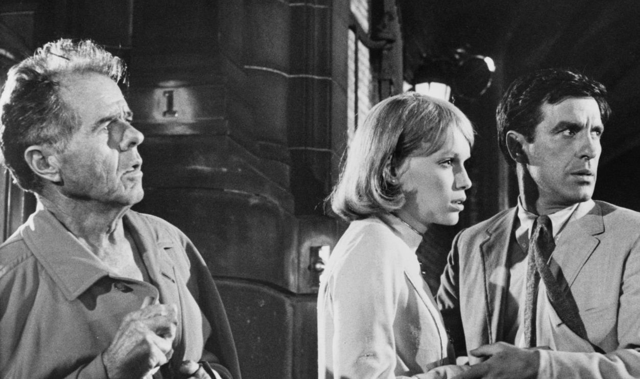 From left to right, American actor Elisha Cook Jr. (1903 - 1995) stars with John Cassavetes (1929 - 1989) and Mia Farrow in the film 'Rosemary's Baby', 1967.