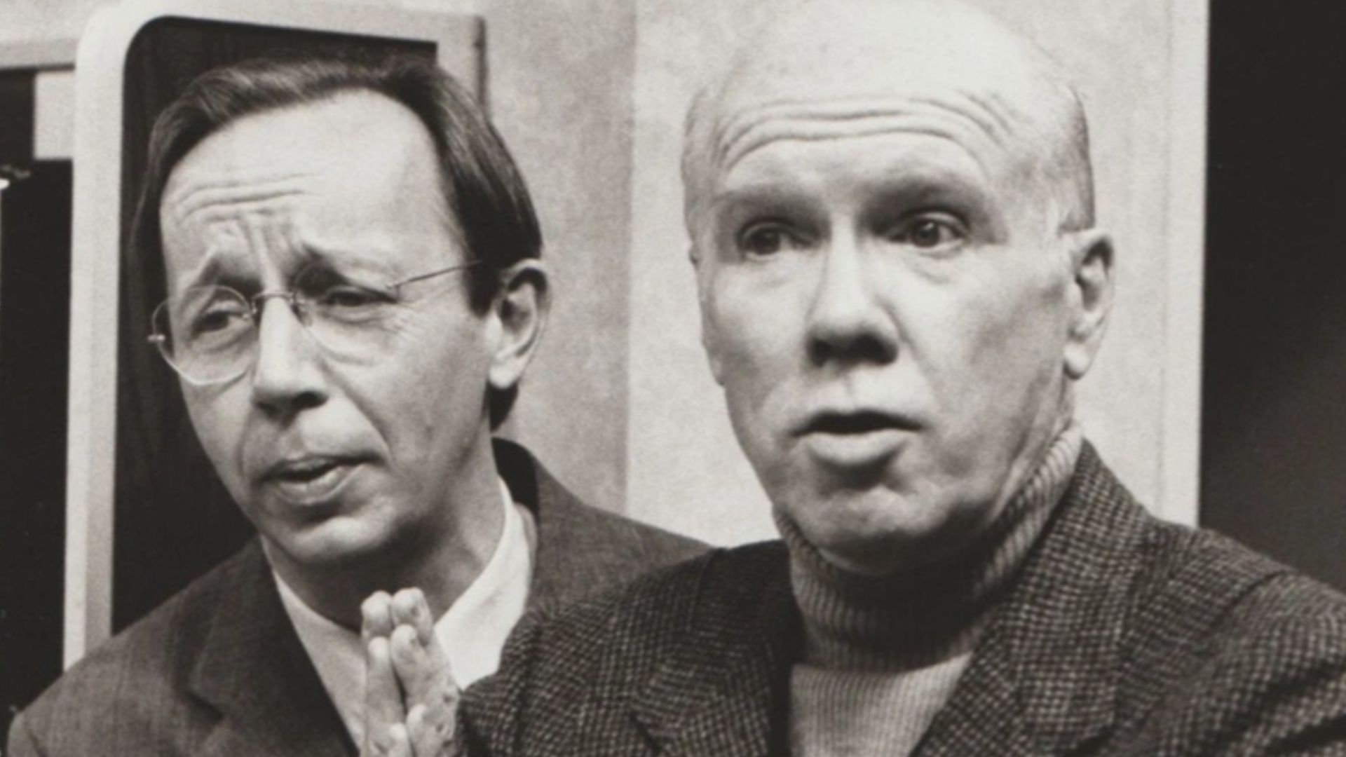 PLEADING – TV station manager Karl (Max Wright, left) pleads with stage manager Woody (John Fiedler) when the latter threatens to leave, in