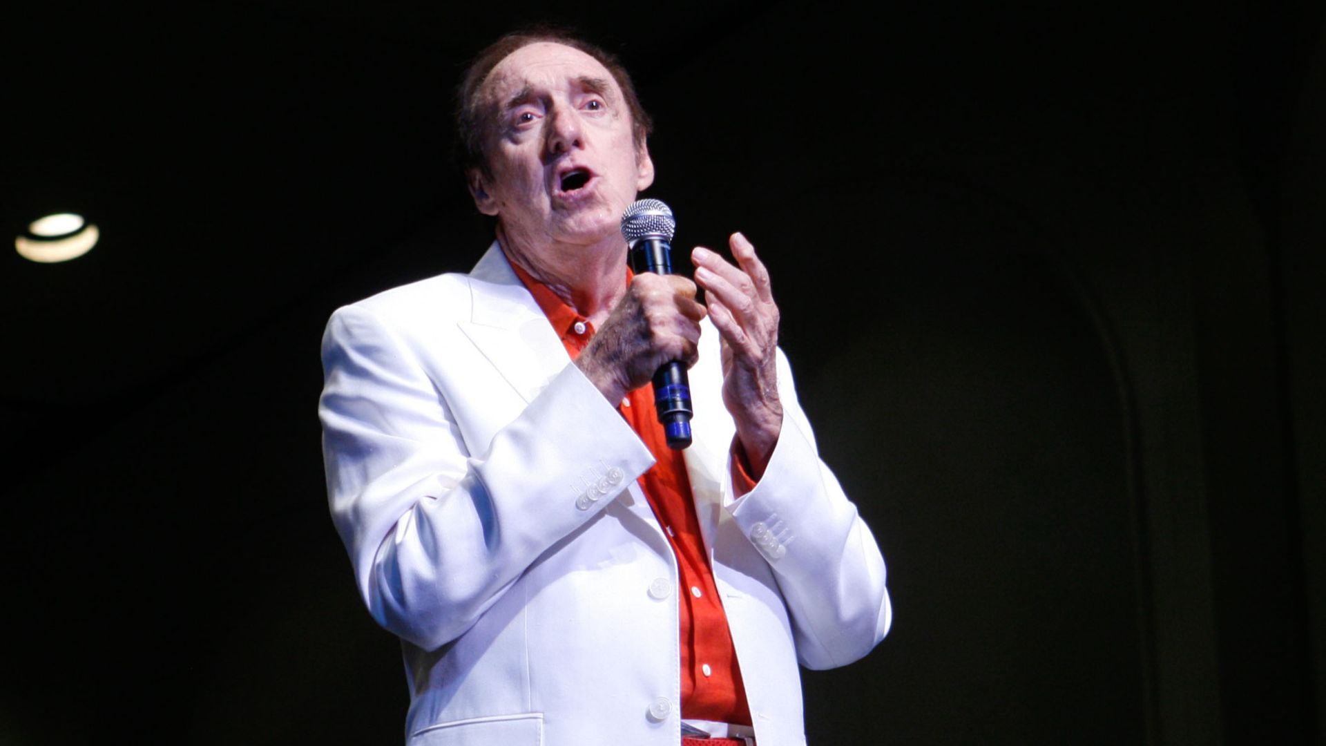 Honorary Marine Cpl. Jim Nabors sings ‘Silent Night’ during the Second Annual Na Mele o na Keiki, 'Music for the Children' Dec. 9 at the Neal S. Blaisdell Center.