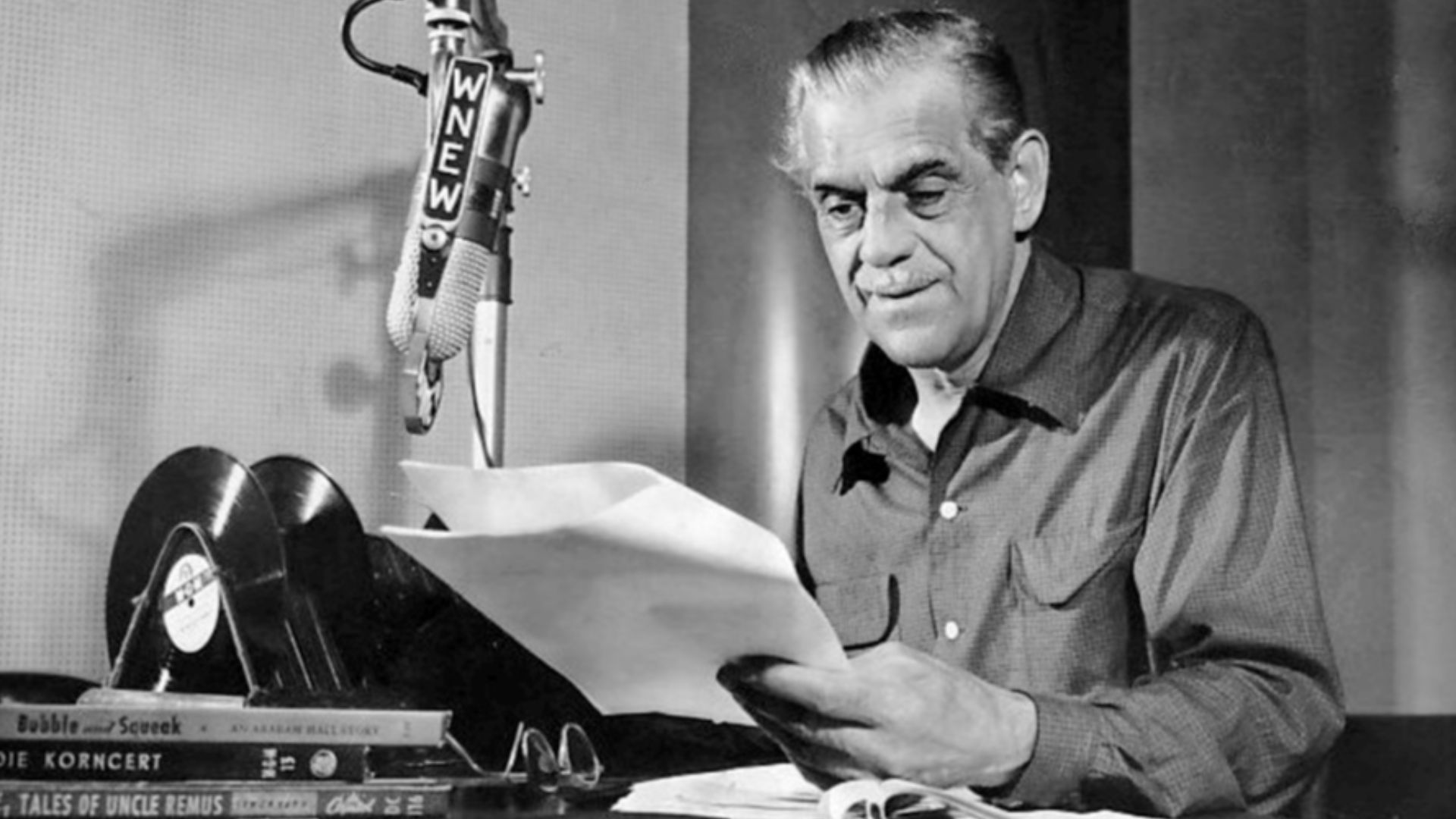 Photo of Boris Karloff doing his weekly radio show at WNEW, New York.  Karloff hosted the weekly program in the late 40s-early 50s.  The show started out as a radio show for children--Karloff told stories, riddles and played children's music--but the prog