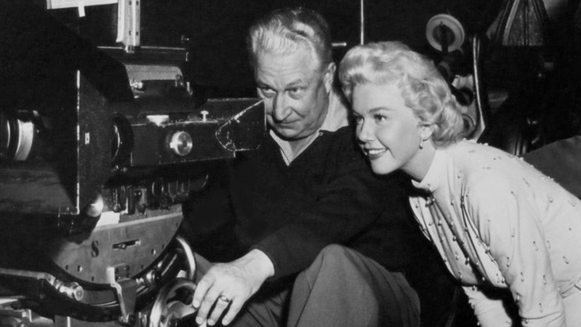 Wilfred M. Cline (cinematographer) and Doris Day, on the set of Lucky Me (1954) - publicity still