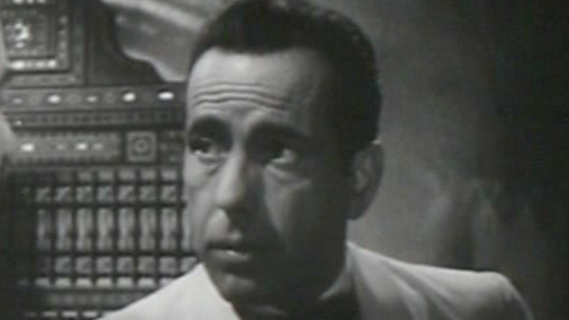 This screenshot shows Humphrey Bogart in a conversation with Sydney Greenstreet.