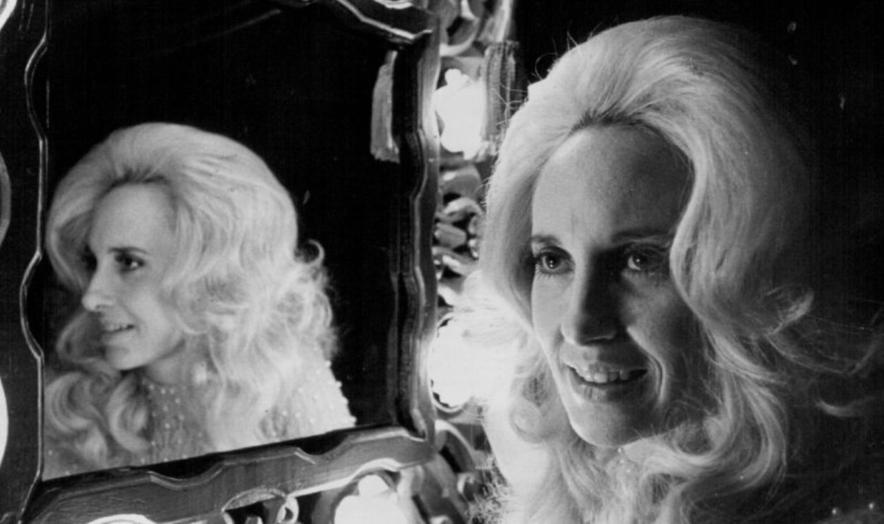 MINNEAPOLIS, MN. - MARCH 1975: Country music singer, songwriter, performer Tammy Wynette at the dressing room mirror aboard her bus before a show at the Guthrie Theater in Minneapolis, Minn., Saturday, March 22, 1975.Minneapolis Tribune photo. 
