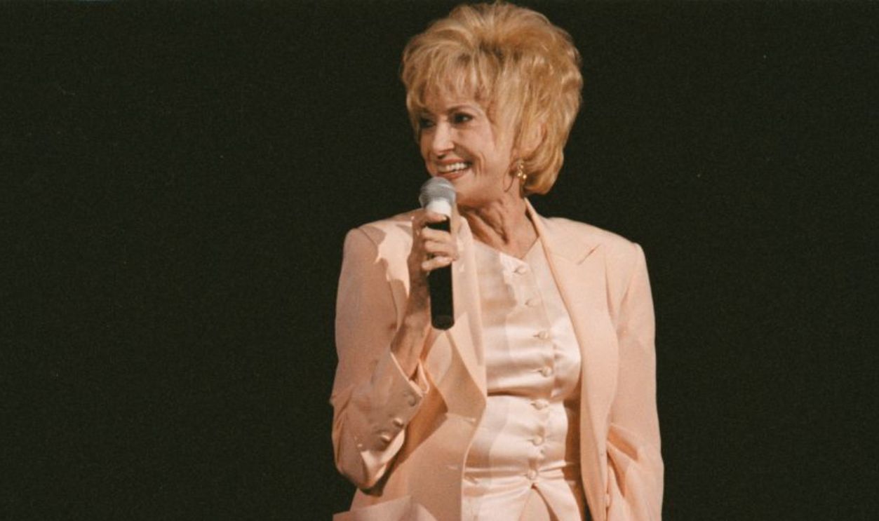 LOS ANGELES - JUNE 30: Country singer Tammy Wynette performs while sitting on a stool at the House of Blues in Los Angeles, California on June 30, 1997.