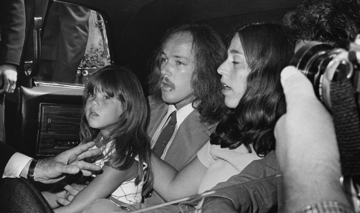  Daughter Owen Elliot and sister Leah Kunkel with her husband Russ attend the funeral for singer Cass Elliot of The Mamas And The Papas at Groman Mortuary on August 2, 1974 in Los Angeles, California.