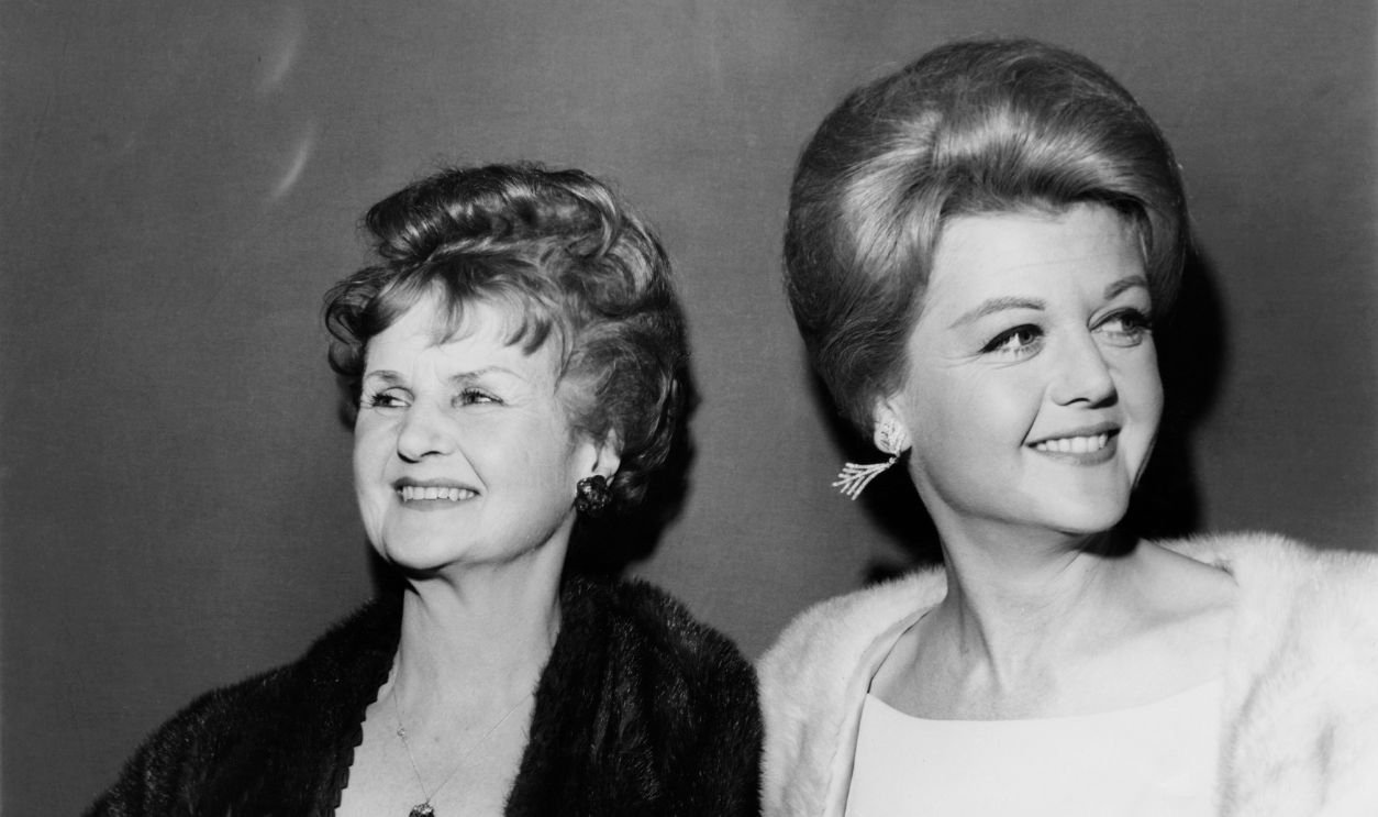 Actress Angela Lansbury (right) with her mother, actress Moyna Macgill (1895 - 1975) at the 35th annual Academy Awards in the Civic Auditorium, Hollywood, California, 16th April 1963. Lansbury was nominated for the Best Supporting Actress award for her role in 'The Manchurian Candidate', but did not win.