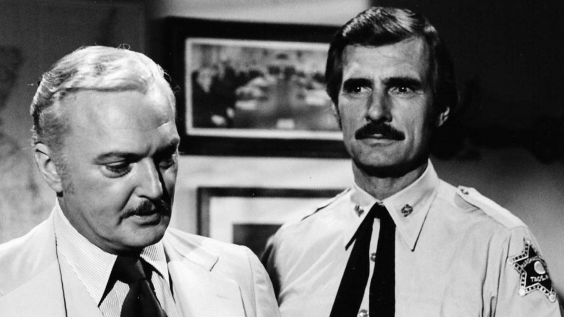 Photo of guest star Jack Cassidy and Dennis Weaver as Sam McCloud from the television series McCloud.