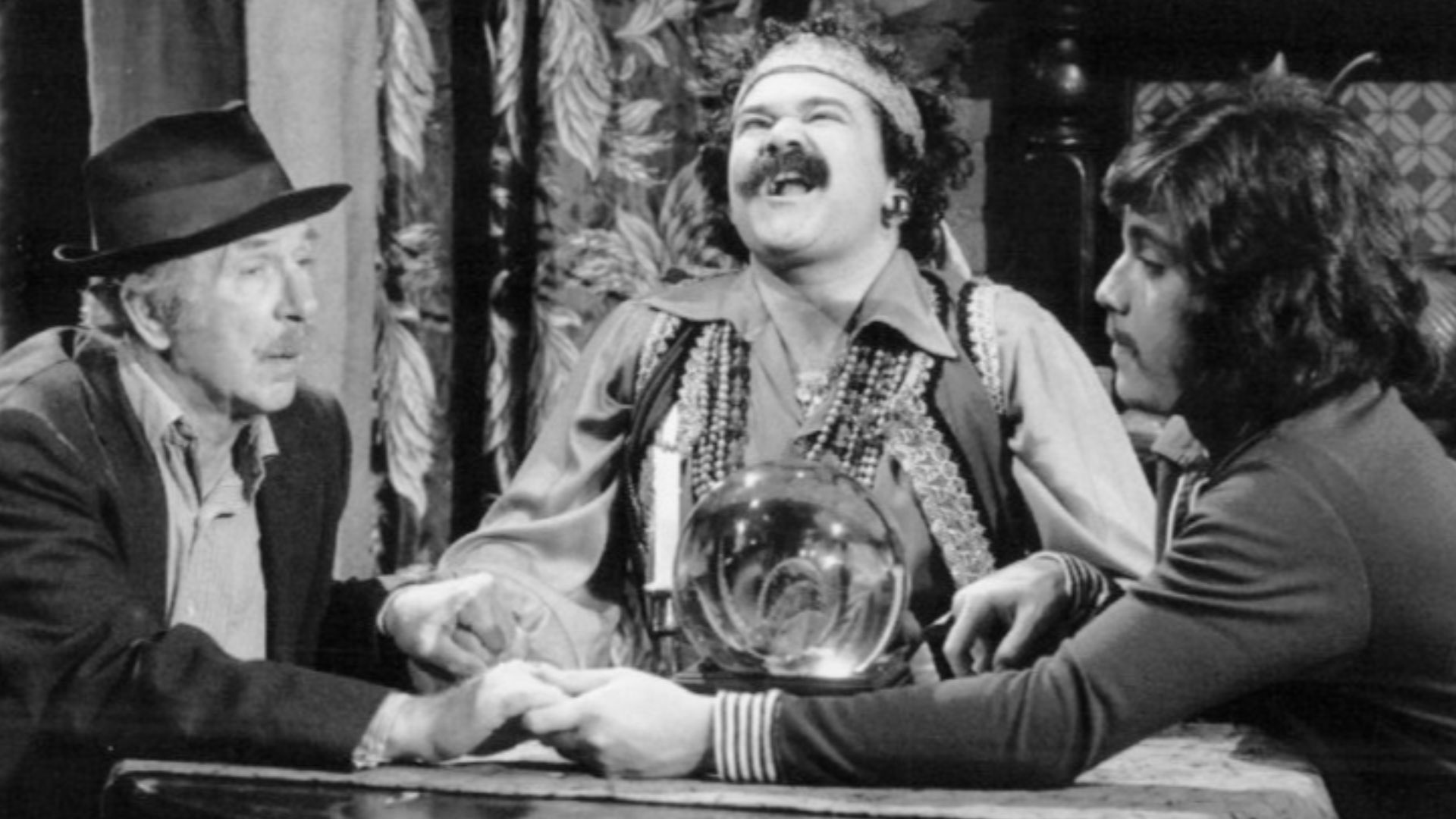 Photo of Jack Albertson, Avery Schreiber and Freddie Prinze from the television program Chico and the Man.  Schreiber plays a very unsuccessful fortune teller Ed and Chico are trying to help out.